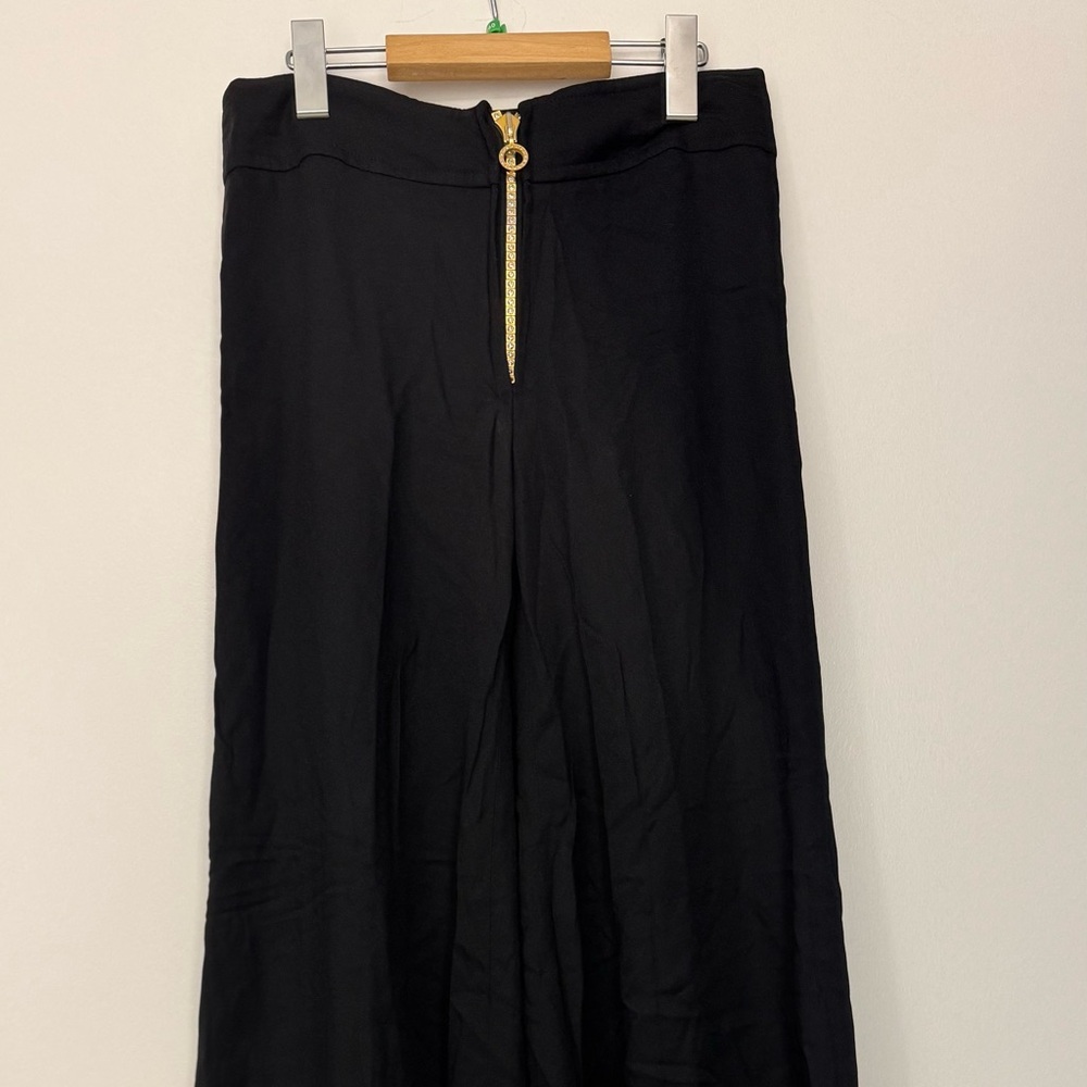 Vintage women’s black disco-style trousers, rhinestone zipper, Studio 54